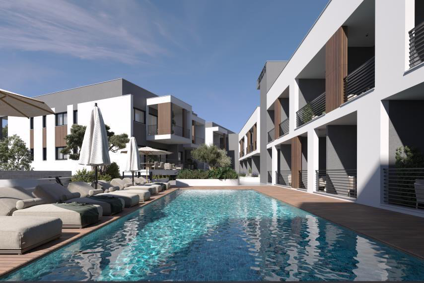 Oasis Sun architectural rendering of the communal pool and apartments